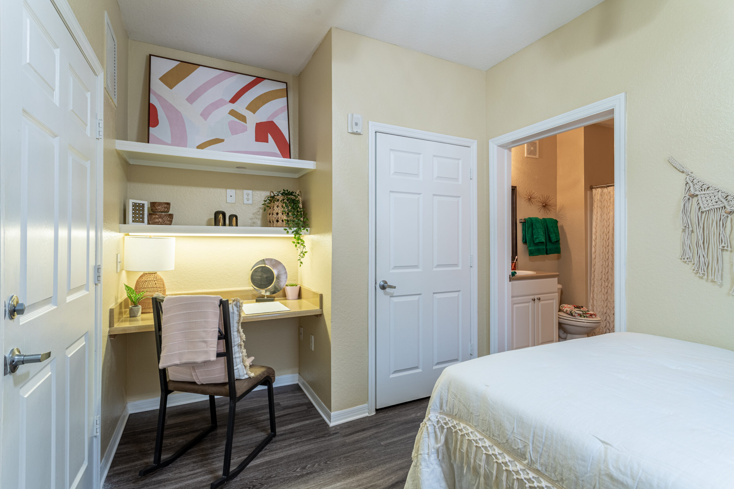 Furnished bedroom with desk